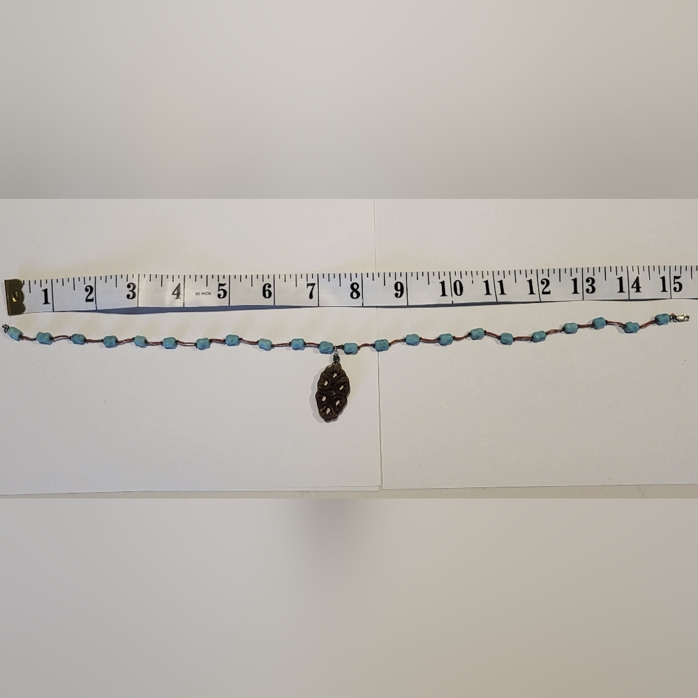 Necklace featuring turquoise nugget beads wth silver clasp. - Picture 5 of 7